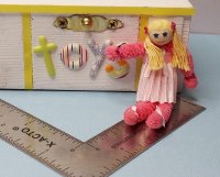Blonde doll with pigtails