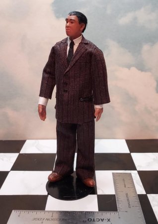 Man in Brown pin-striped suit