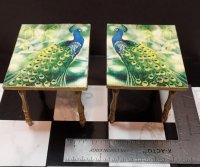 Peacock end tables, facing pair